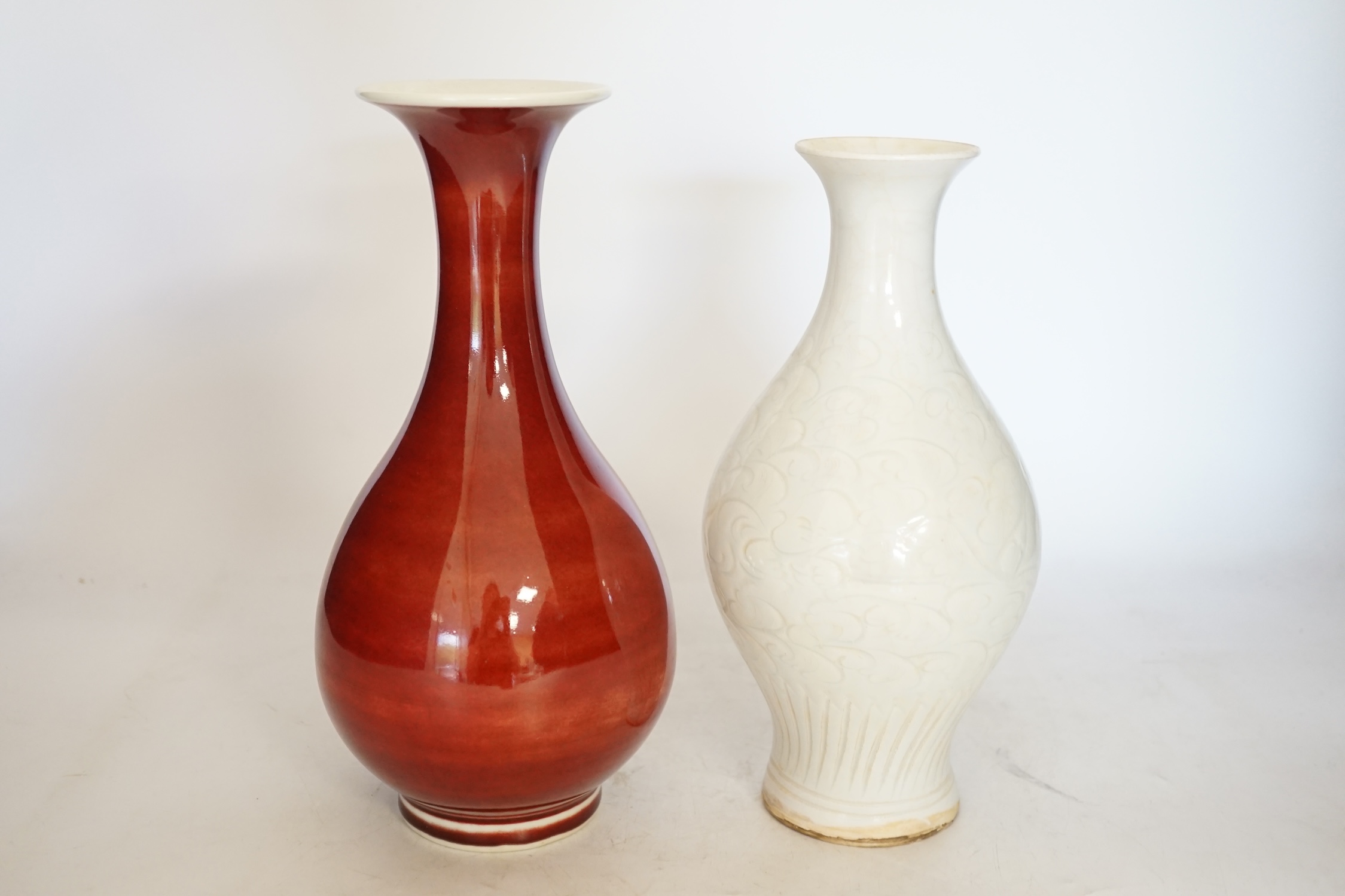 Two Chinese vases including a sang de boeuf example, largest 25cm high. Condition - larger example good, other with crazing